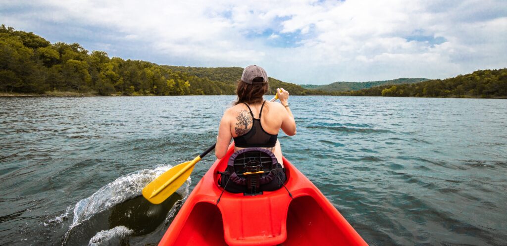 woman on a canoe out on the open water